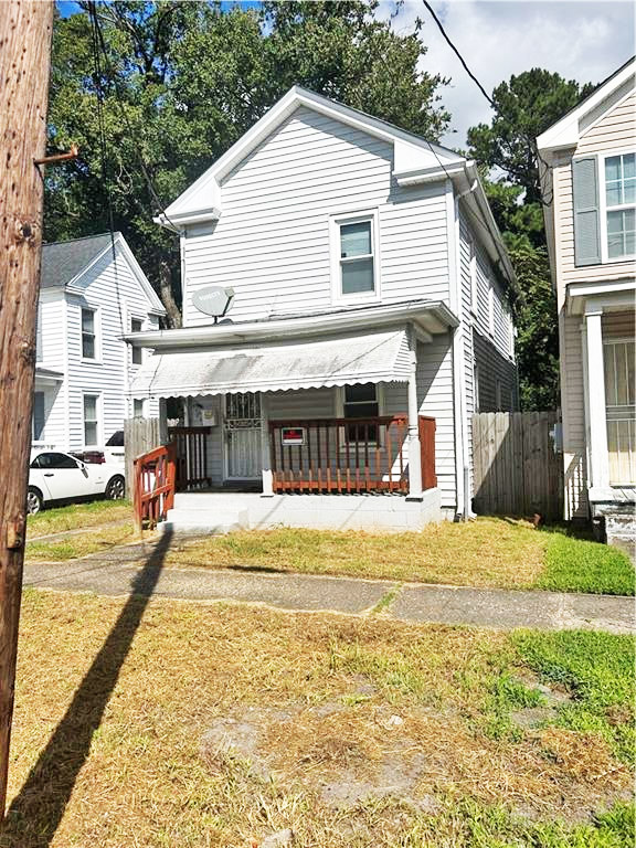 front of property located at 1145 Commerce Avenue, Chesapeake, Virginia 23324